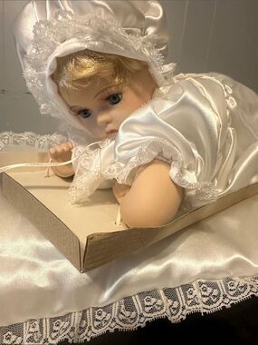 Porcelain Baby Doll in White Satin Christening Gown